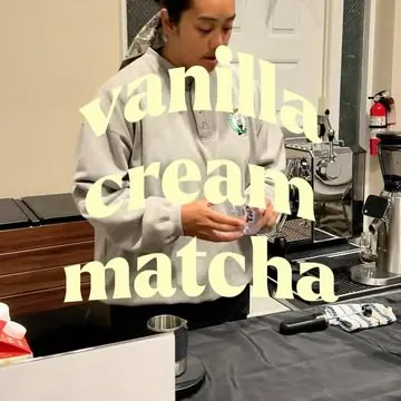 Darlene making a vanilla cream matcha at a pop-up
